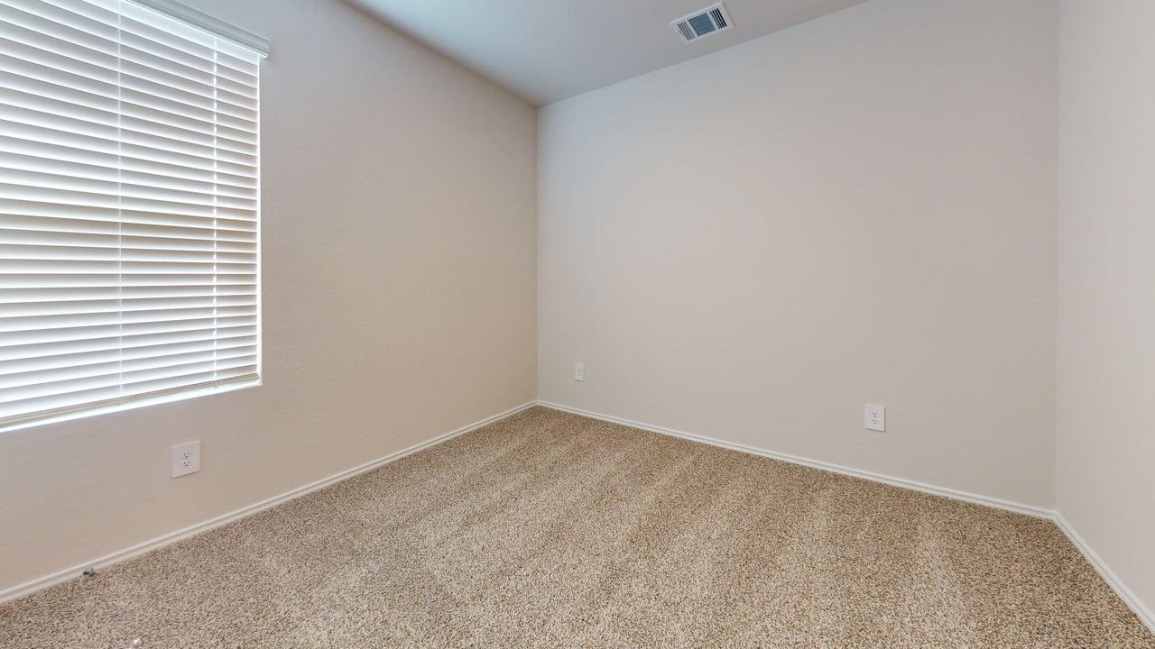 914 Indian Way Seguin, TX 78155 - Photo 12 of 18 an empty room with a window