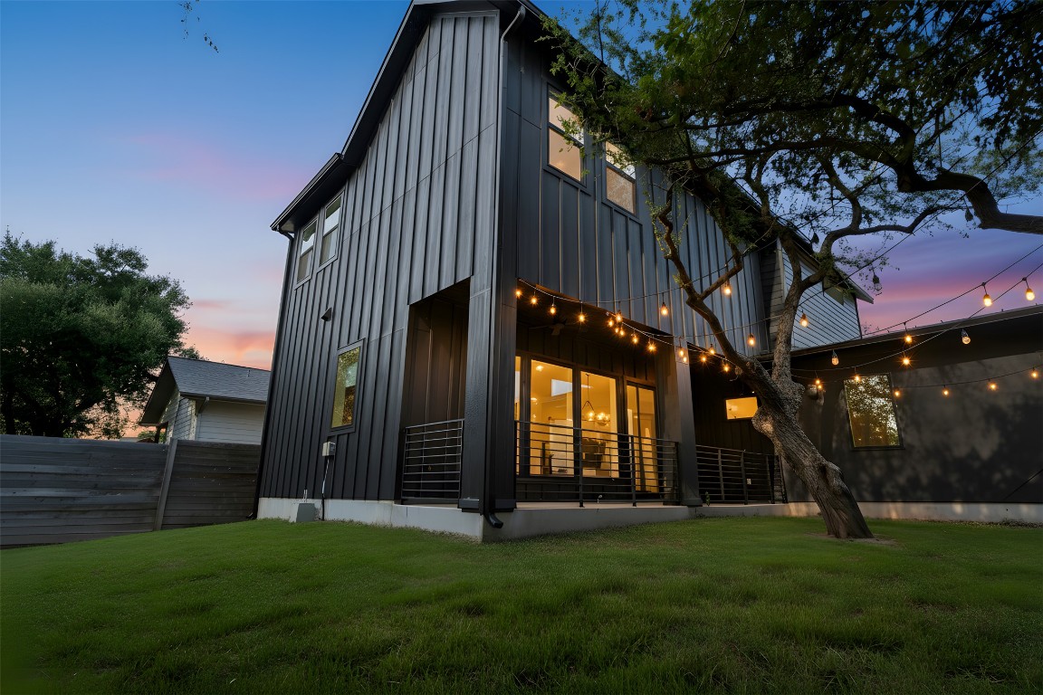 18205 Fair Lane Jonestown, TX 78645 - Photo 20 of 40 a view of a house with a yard