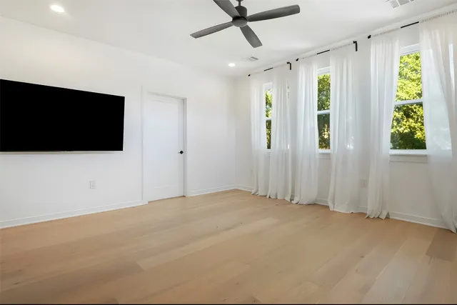 a view of a livingroom with a flat screen tv