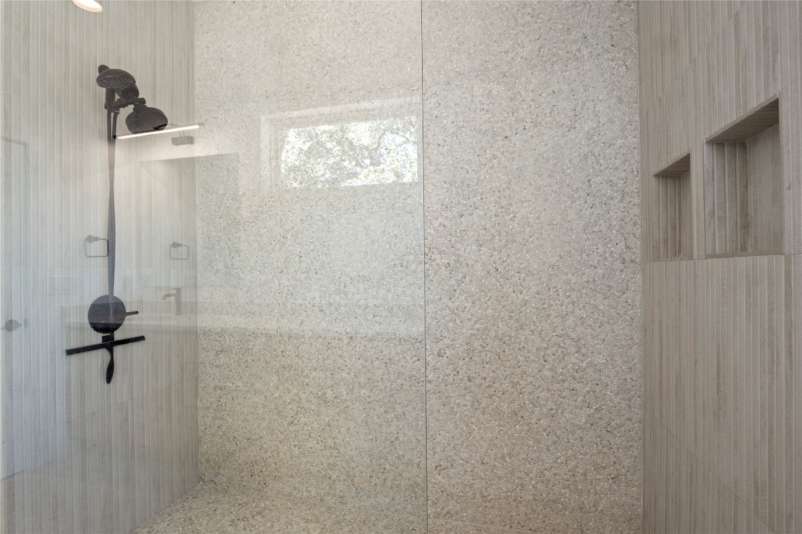 18205 Fair Lane Jonestown, TX 78645 - Photo 25 of 40 a bathroom with a shower