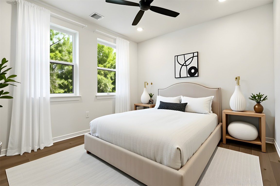 18205 Fair Lane Jonestown, TX 78645 - Photo 27 of 40 a bedroom with a bed and window