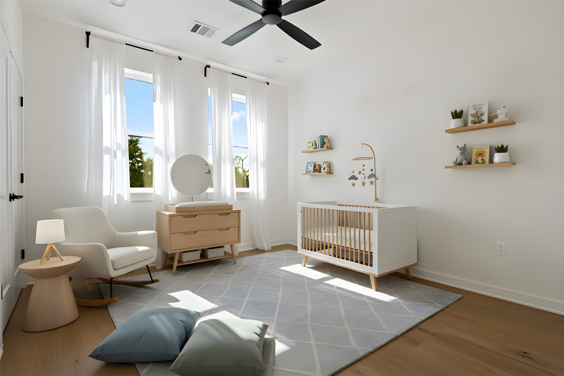 18205 Fair Lane Jonestown, TX 78645 - Photo 30 of 40 a bedroom with furniture and a window