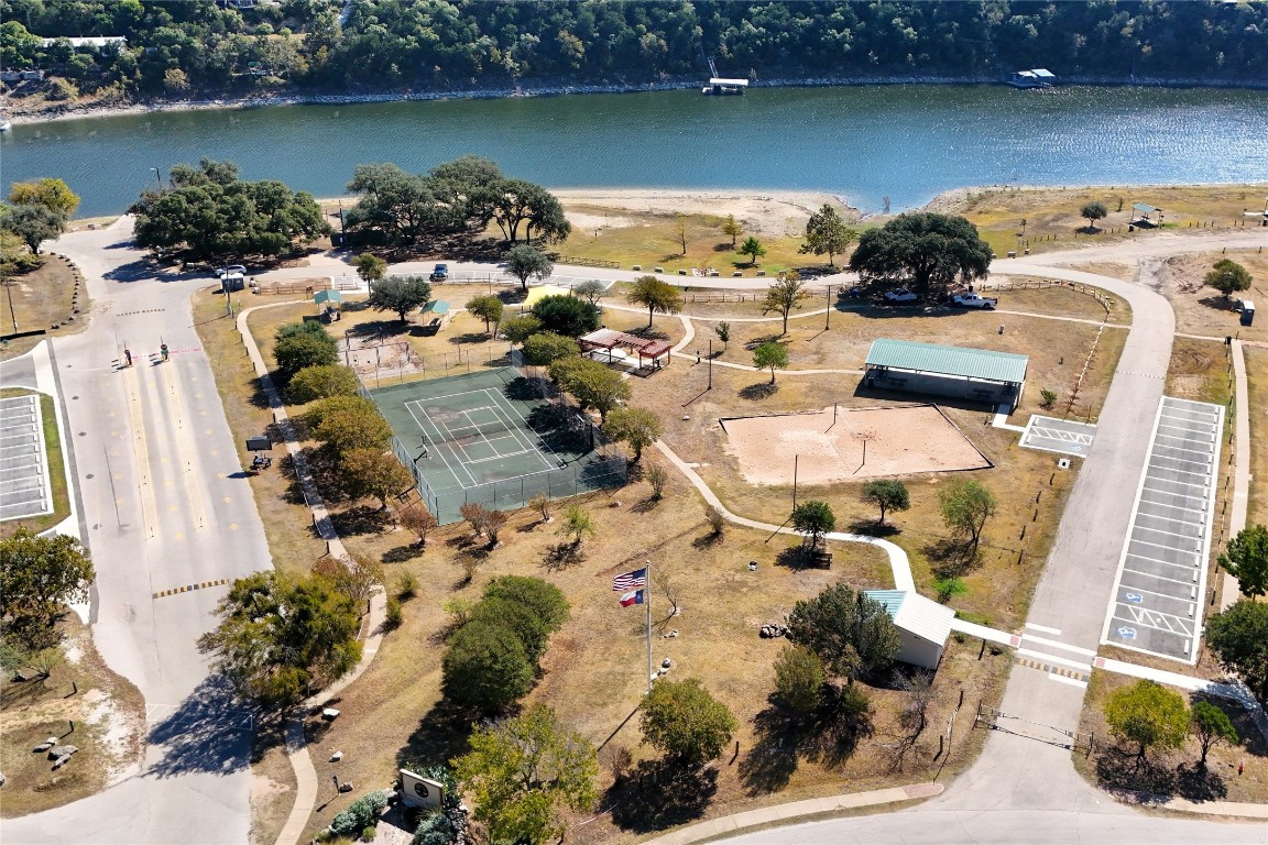 18205 Fair Lane Jonestown, TX 78645 - Photo 3 of 40 a view of a lake with outdoor space
