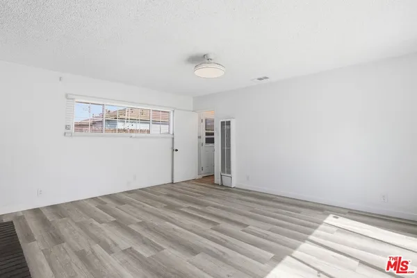 a view of a room with an empty space