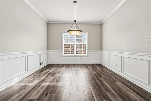 a kitchen with stainless steel appliances granite countertop a sink refrigerator stove and microwave