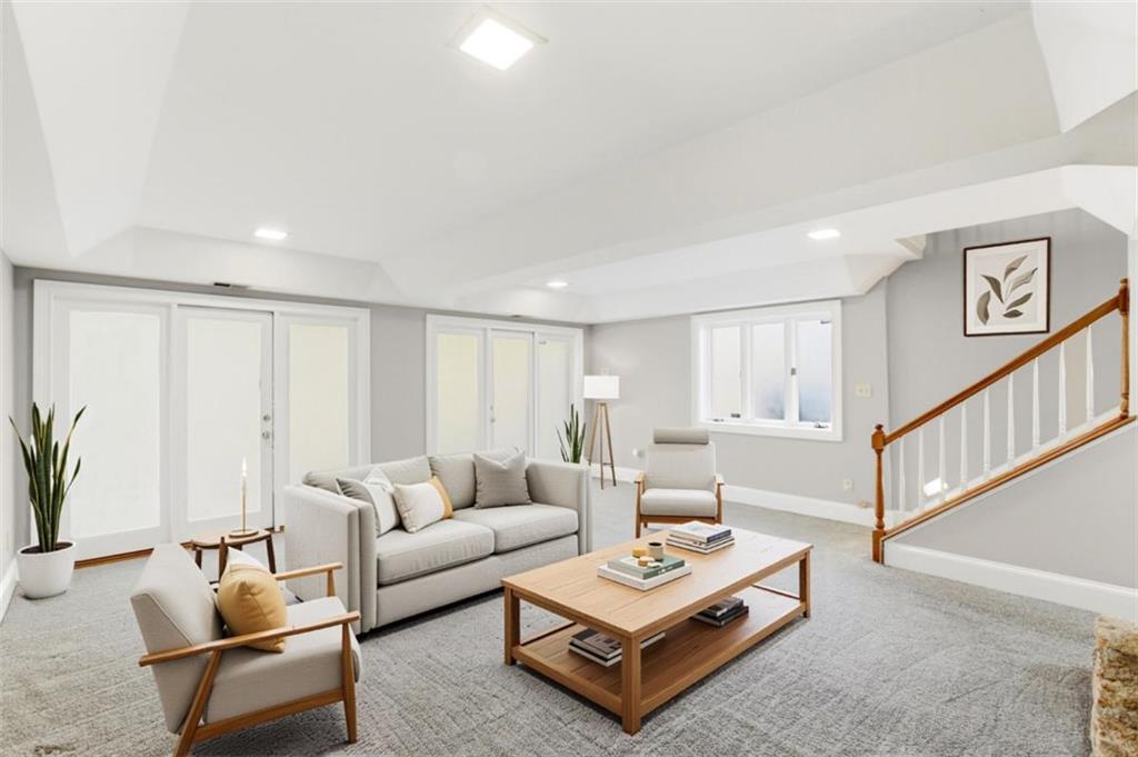 3959 Randall Mill Road Northwest Atlanta, GA 30327 - Photo 9 of 29 a living room with furniture and a potted plant