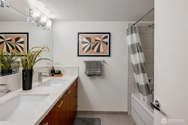 a kitchen with a refrigerator and a sink