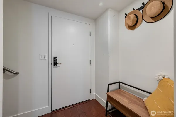a view of entryway with wooden floor