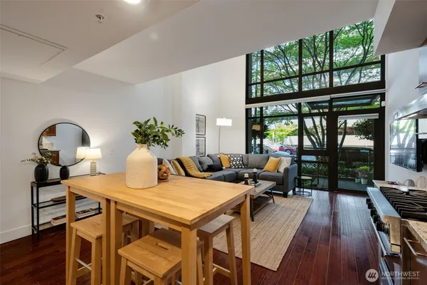 a view of a dining room with furniture window and outside view