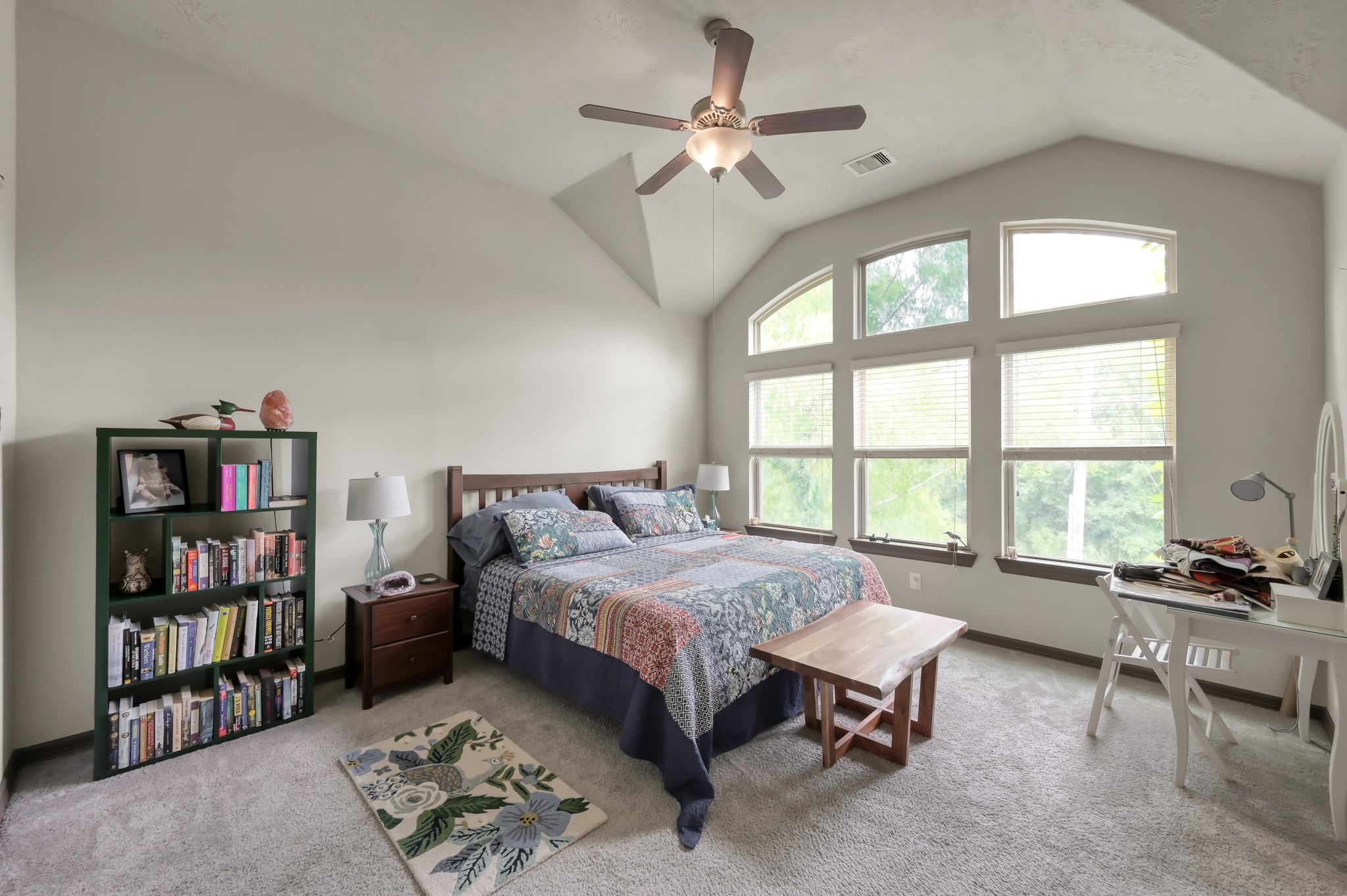 18 Aventura Place Spring, TX 77389 - Photo 25 of 43 a bedroom with a bed furniture and a book shelf