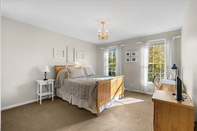 a bed room with a bed and a couch