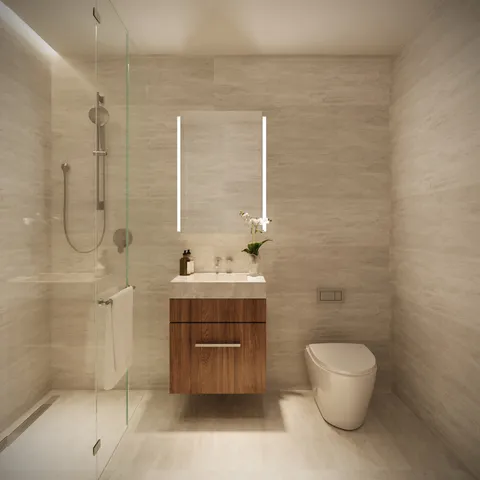 a bathroom with a toilet sink and shower
