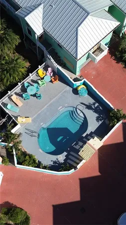 a kitchen with a table and chairs