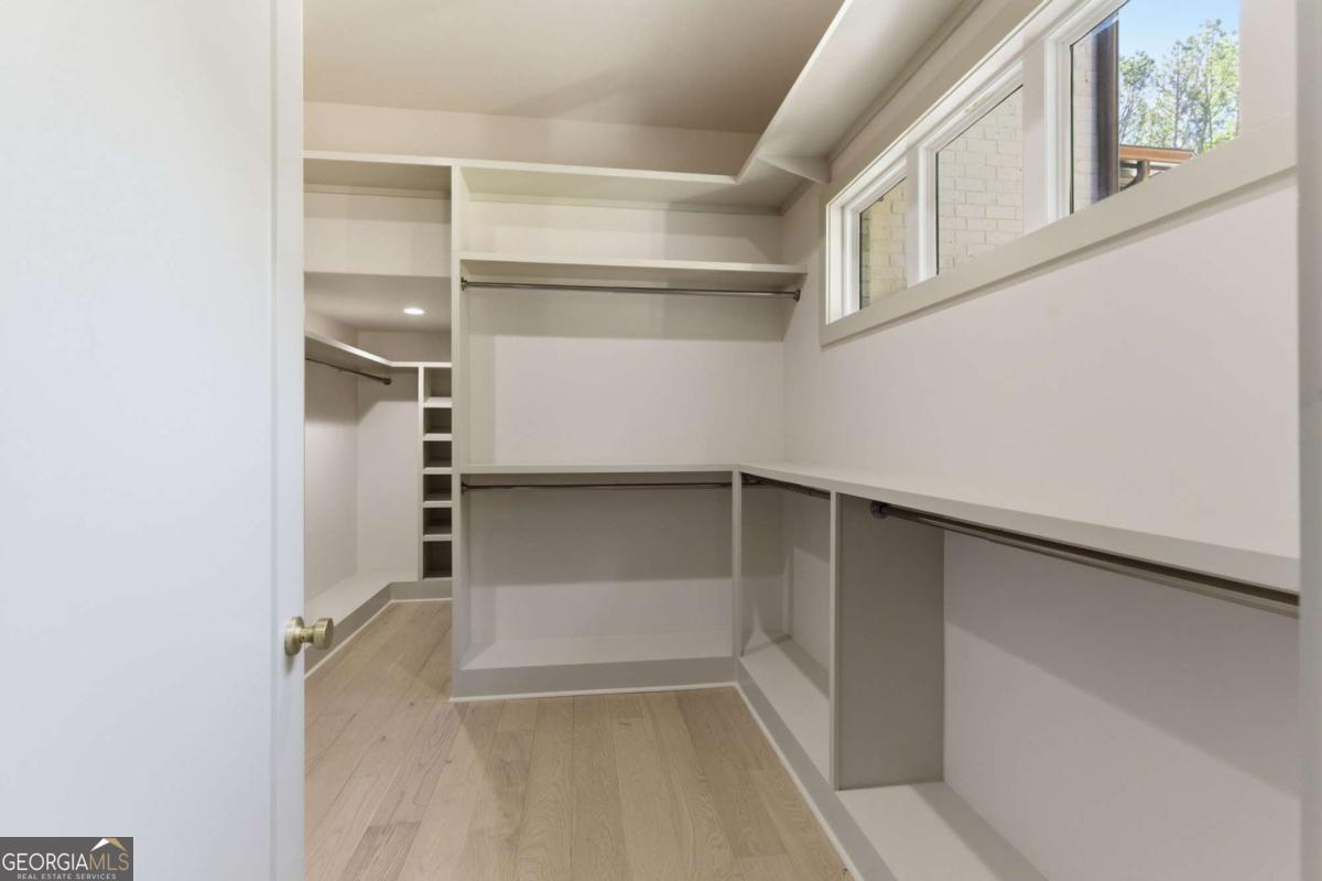 1315 Sandy Creek Road Tyrone, GA 30290 - Photo 81 of 100 a view of an empty walk in closet