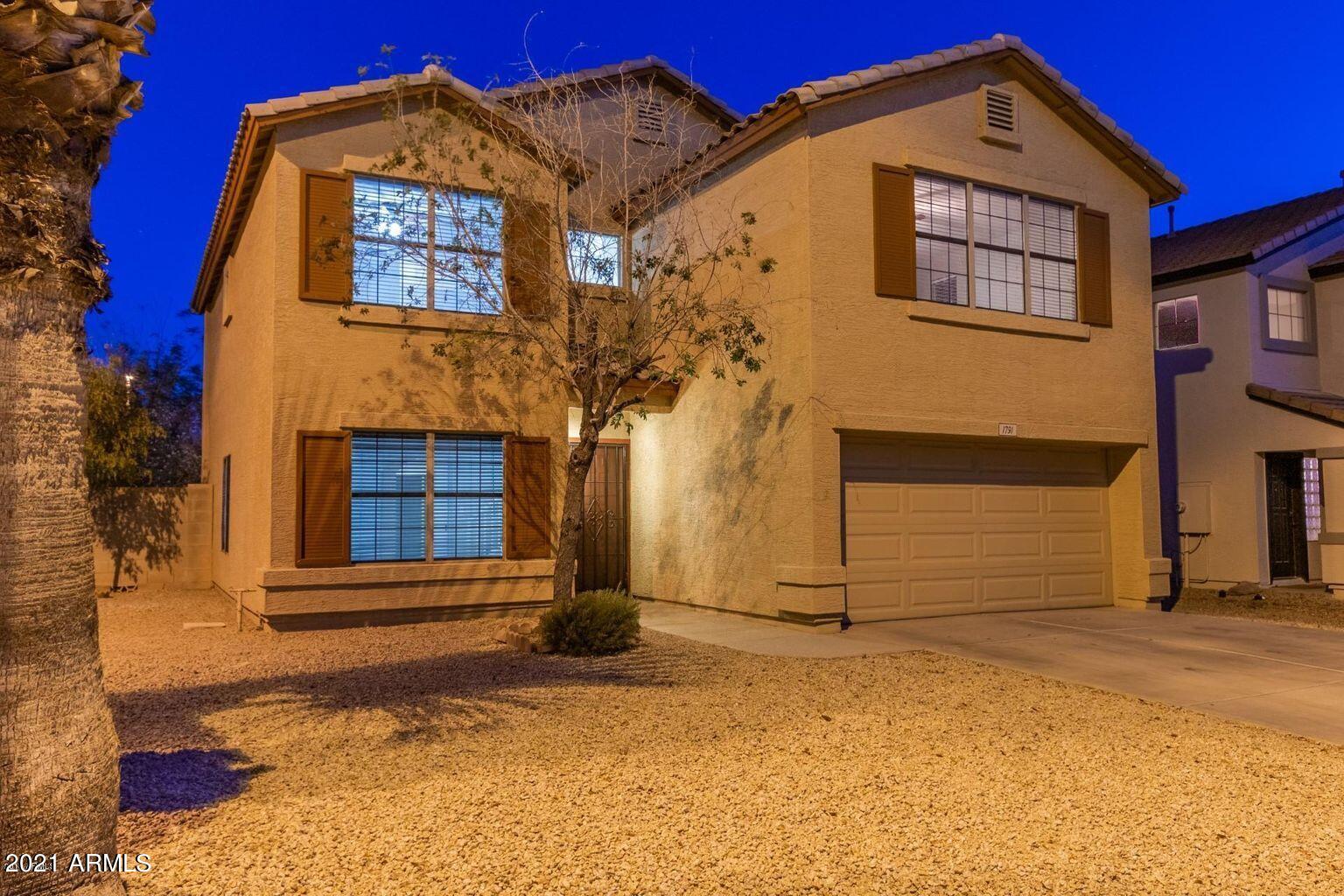 1791 East Del Rio Street Gilbert, AZ 85295 - Photo 1 of 28 a front view of a house with a yard