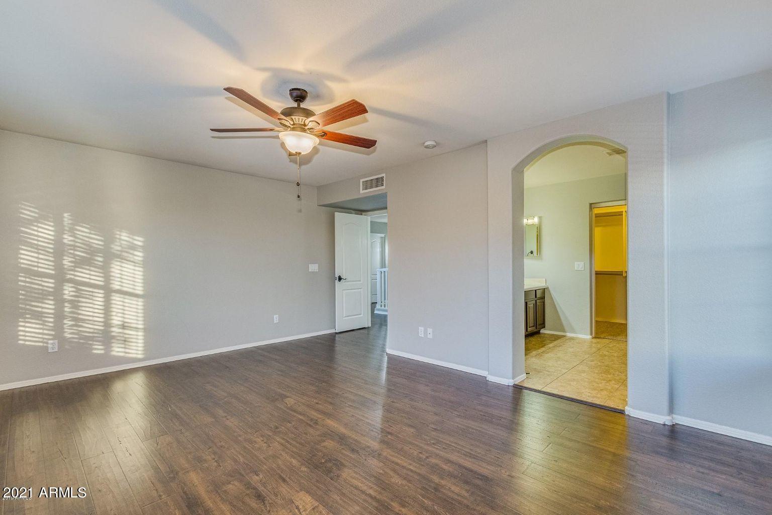 1791 East Del Rio Street Gilbert, AZ 85295 - Photo 14 of 28 wooden floor in an empty room with a window