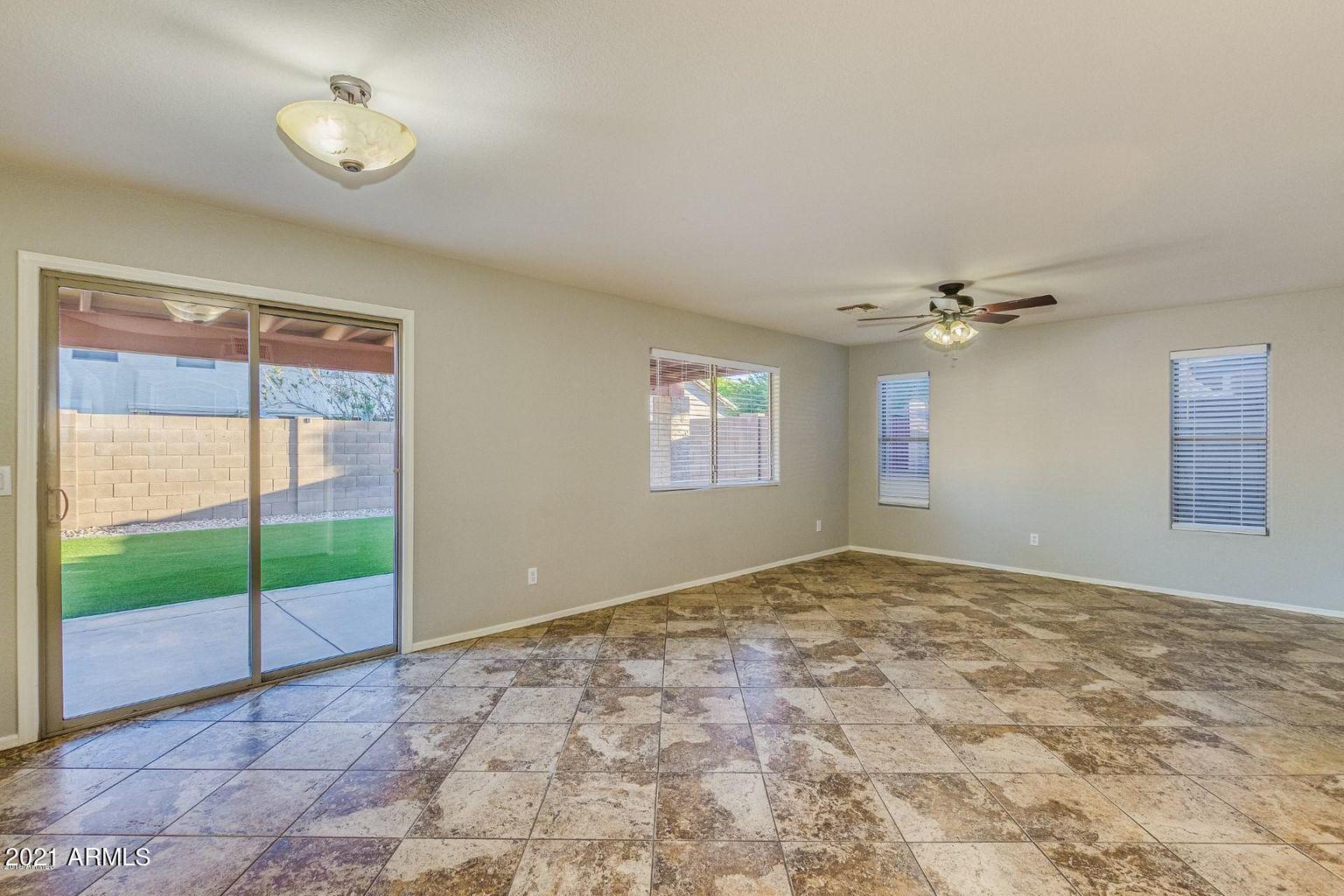 1791 East Del Rio Street Gilbert, AZ 85295 - Photo 5 of 28 a view of an empty room with a window