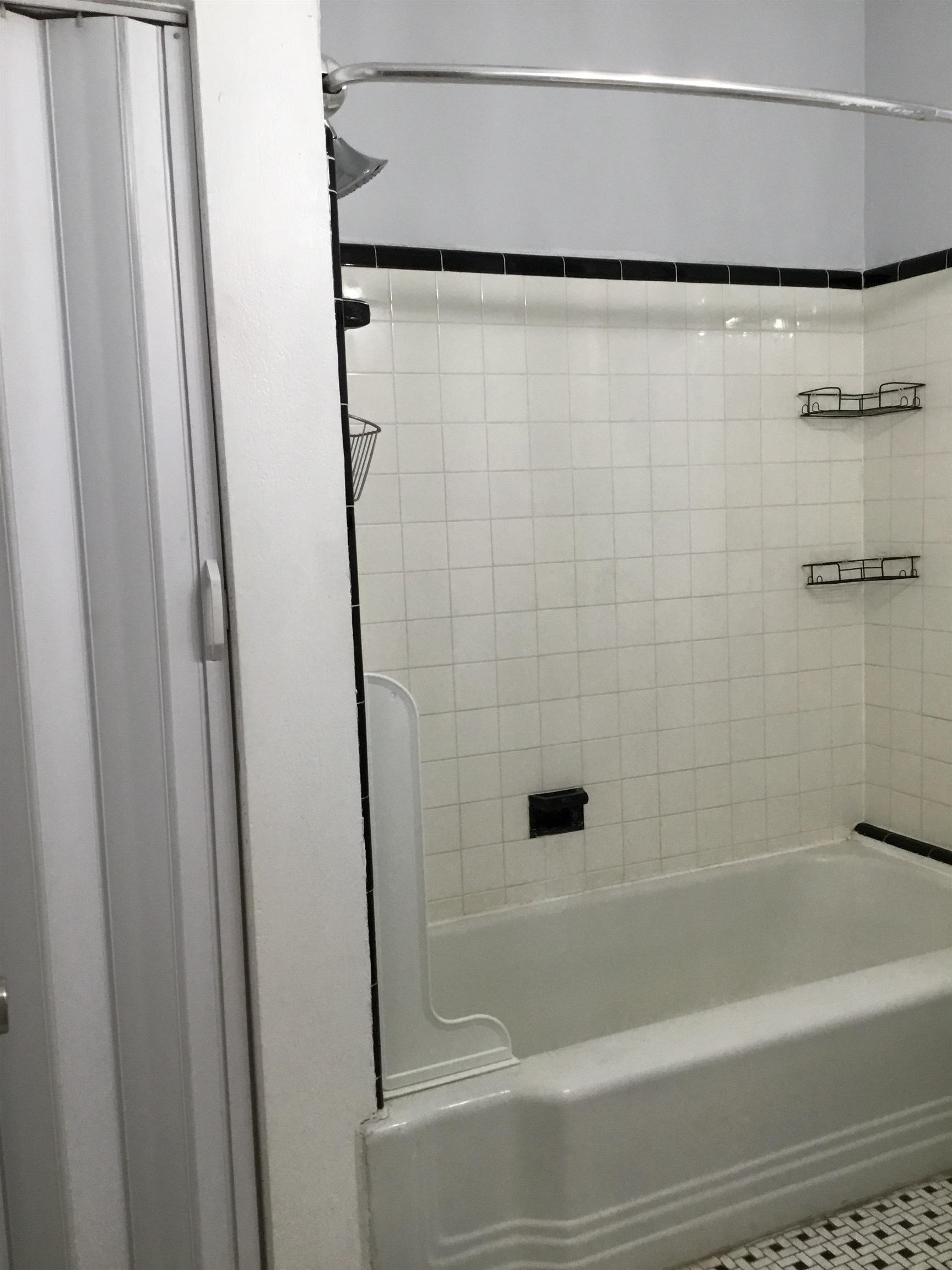 1407 70th Street, Unit 2 North Bergen, NJ 07047 - Photo 21 of 22 a bathroom with a shower and a shower