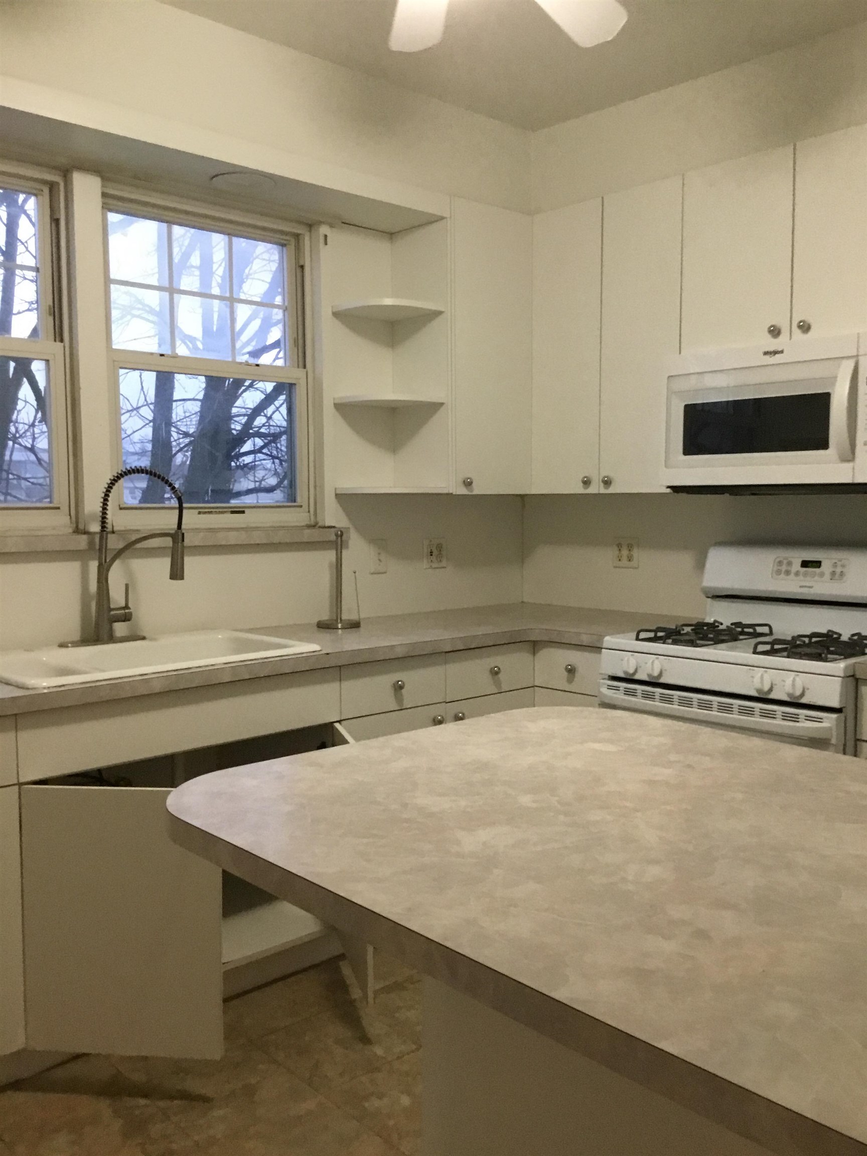 1407 70th Street, Unit 2 North Bergen, NJ 07047 - Photo 3 of 22 a kitchen with appliances cabinets and a sink