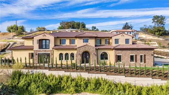 an aerial view of a house with a garden