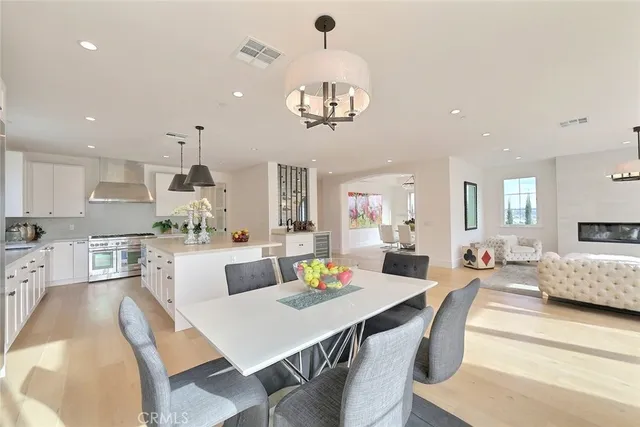 a kitchen with a stove and a refrigerator