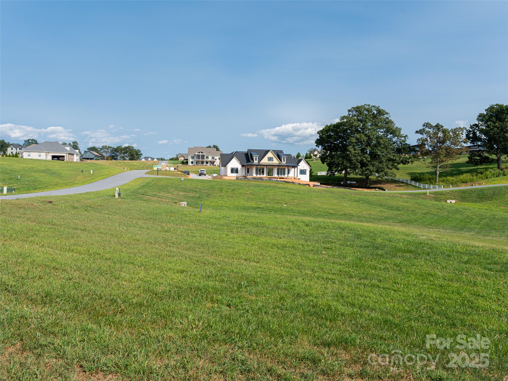 109 Double Knob Road, Unit 66 Mills River, NC 28759 - Photo 7 of 10 a view of a field with an ocean