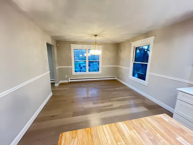 a view of a room with kitchen island and a window
