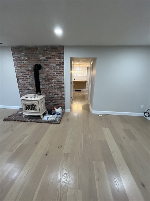 33 Highview Road Rockport, MA 01966 - Photo 27 of 31 a view of a livingroom with wooden floor and staircase