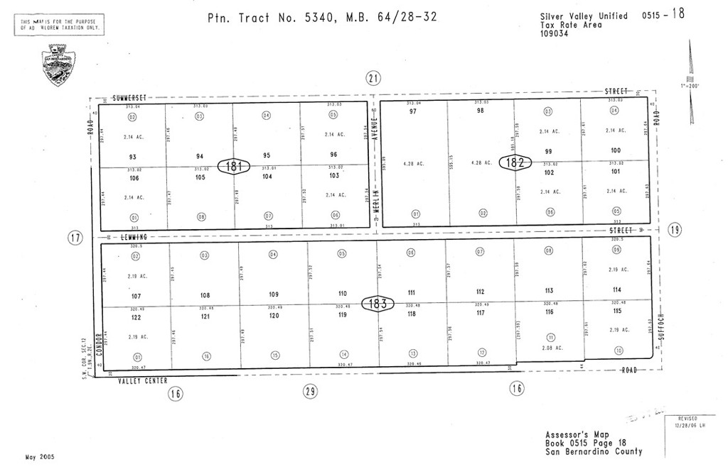 a black and white photo of a black gate