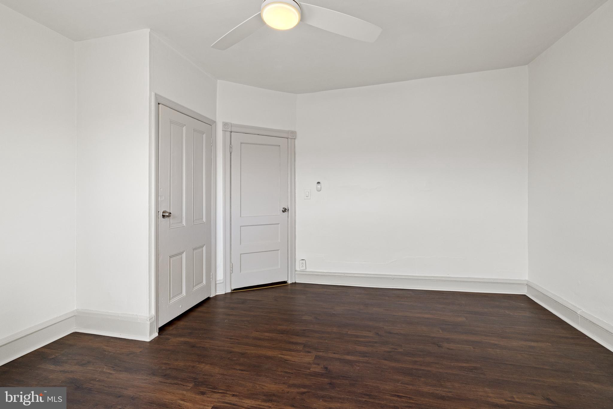 5551 Addison Street Philadelphia, PA 19143 - Photo 14 of 21 a view of an empty room and wooden floor