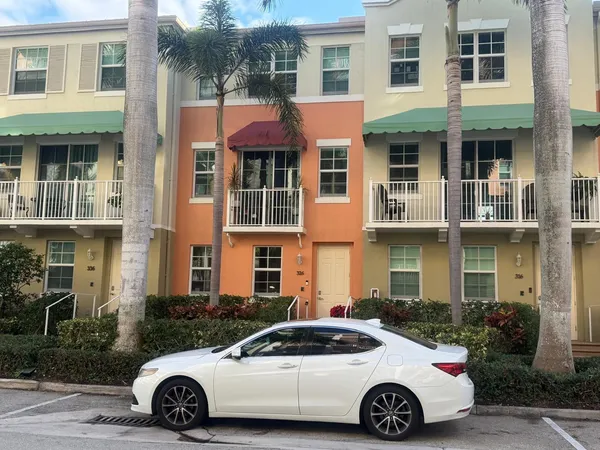 a car parked in front of a house