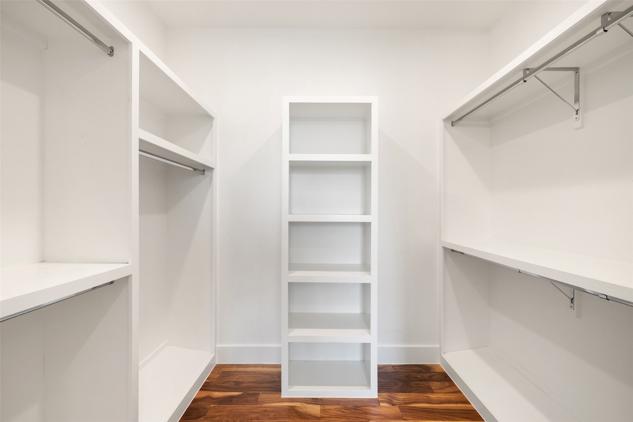 5601 Jackie Robinson Street, Unit 1 Austin, TX 78721 - Photo 23 of 40 Spa-inspired primary suite serves as a true retreat, featuring a luxurious bath and oversized walk-in closet.