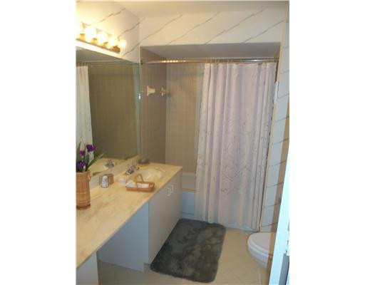 20973 Boca Ridge Drive West Boca Raton, FL 33428 - Photo 9 of 16 a bathroom with a sink and a mirror