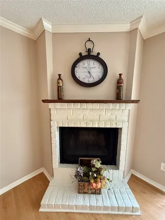 a kitchen with a sink a stove and a refrigerator