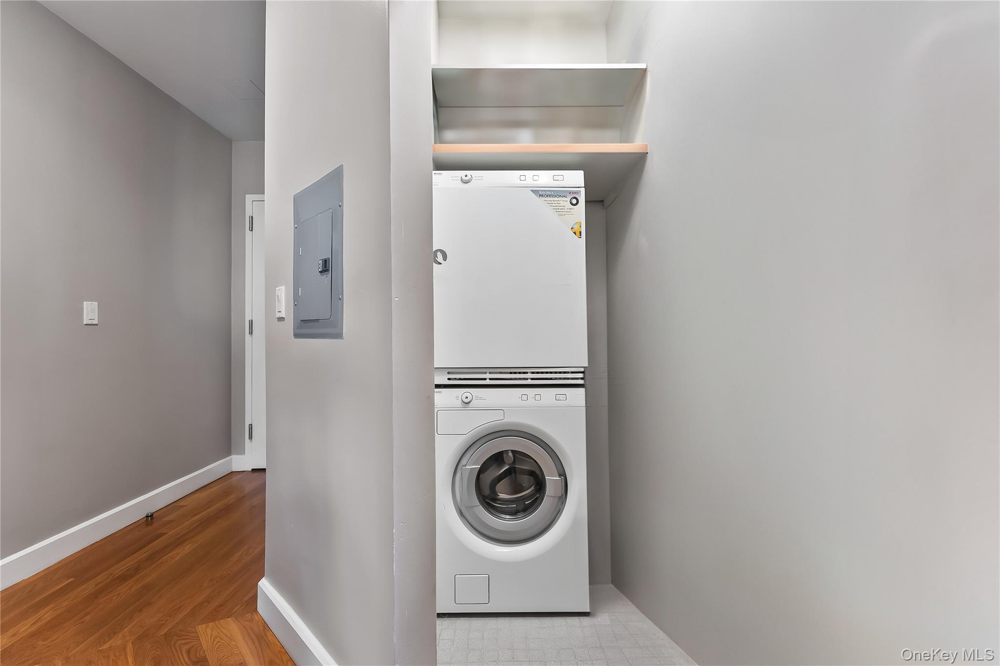 11-24 31st Avenue, Unit 12A Queens, NY 11106 - Photo 26 of 36 a view of washer and dryer