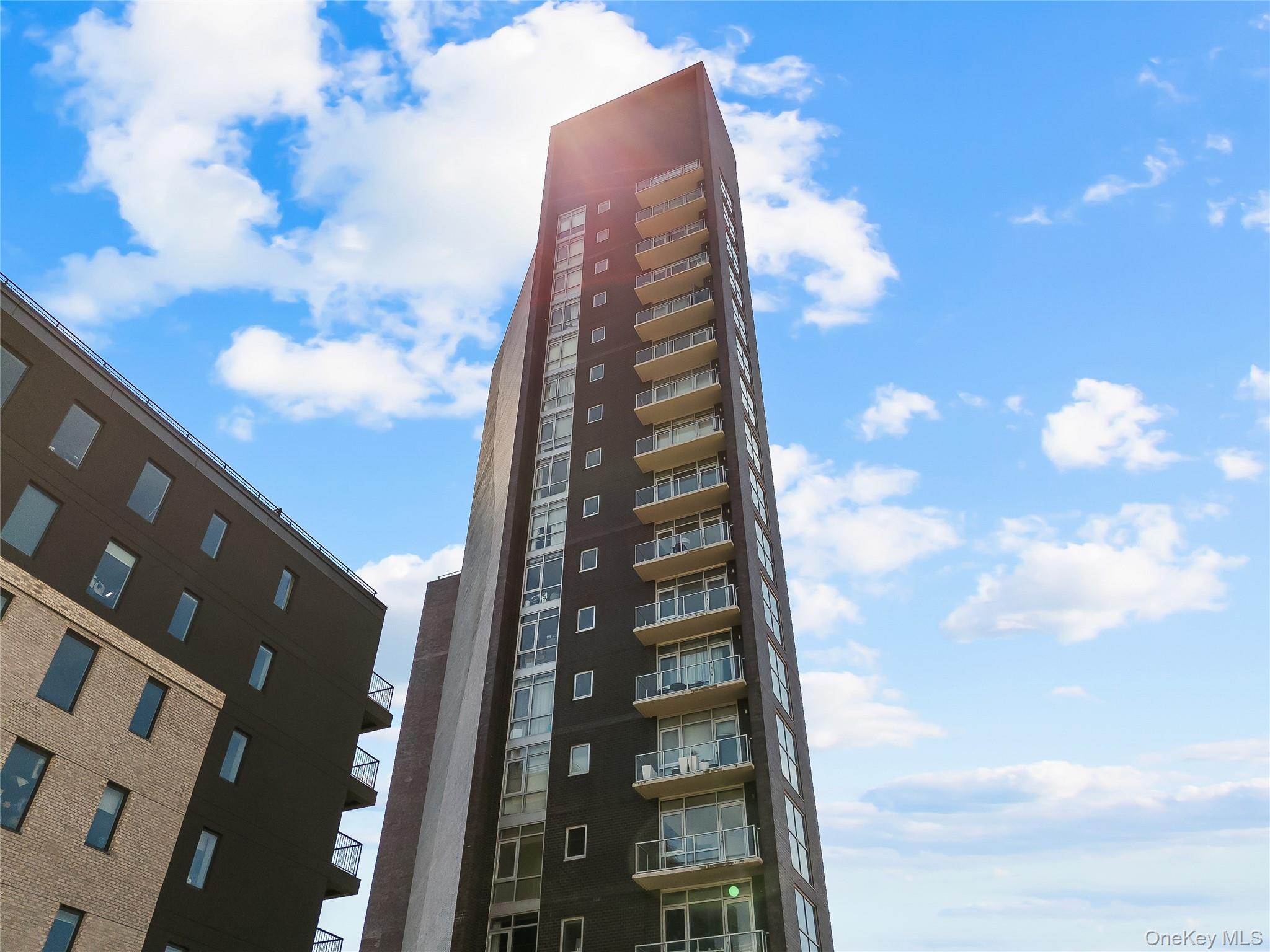 11-24 31st Avenue, Unit 12A Queens, NY 11106 - Photo 33 of 36 a view of a tall building