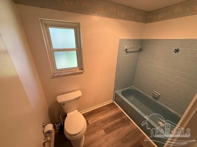 a bathroom with a toilet