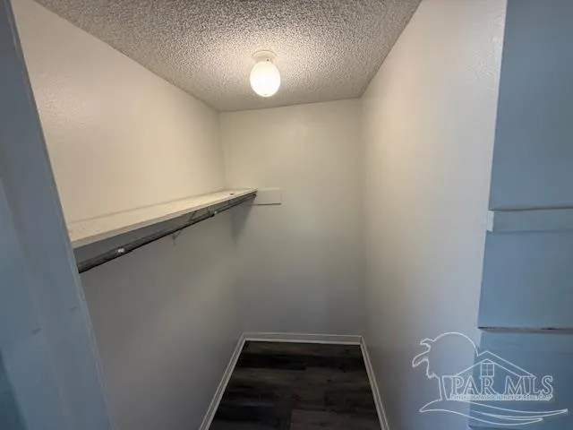 a view of small space with racks on the wall