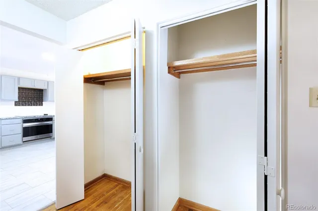a bathroom with a sink mirror and toilet