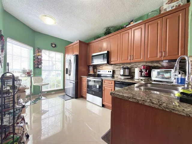 $420,000 | 14345 Southwest 57th Lane, Unit 51, Miami, FL 33183