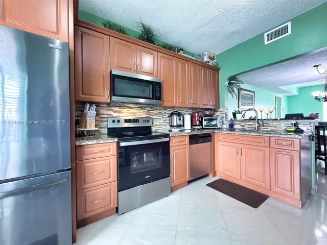 $420,000 | 14345 Southwest 57th Lane, Unit 51, Miami, FL 33183