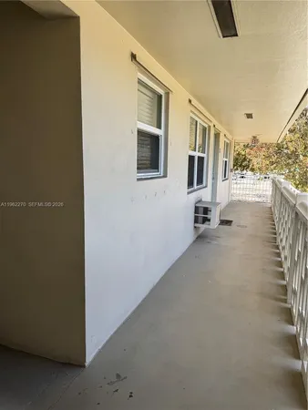 a view of a house with a street
