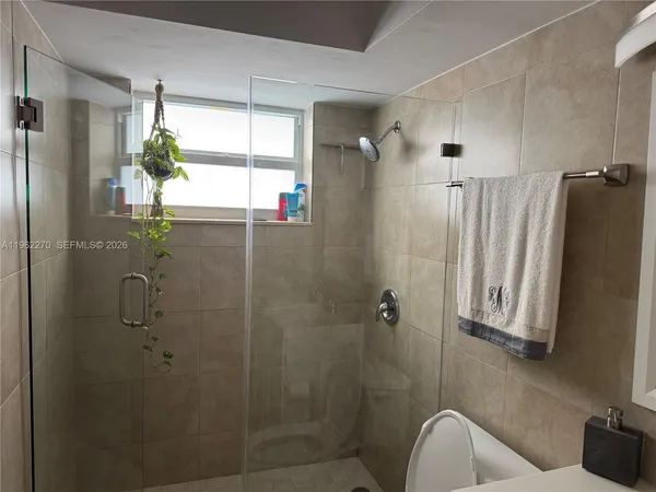 a bathroom with a toilet and a sink