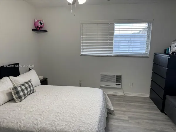 a kitchen with sink and cabinets