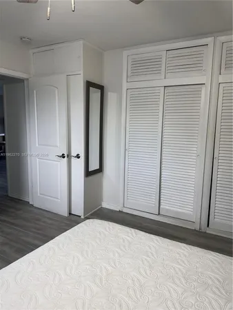 a kitchen with stainless steel appliances granite countertop a refrigerator stove and microwave