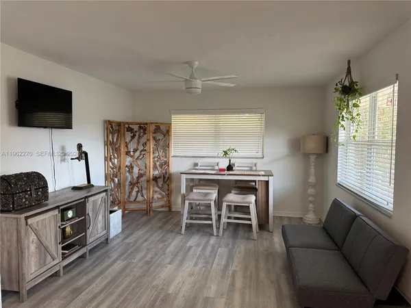 a storage stove top oven sitting inside of a kitchen
