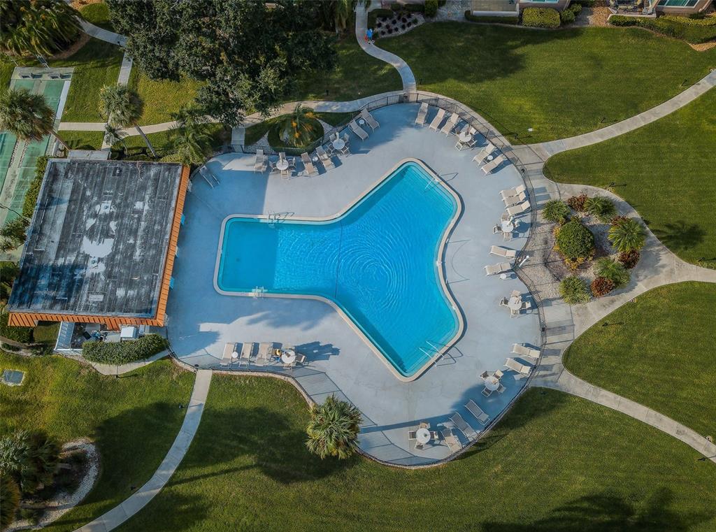 634 Edgewater Drive, Unit 447 Dunedin, FL 34698 - Photo 44 of 53 an aerial view of a house with a yard