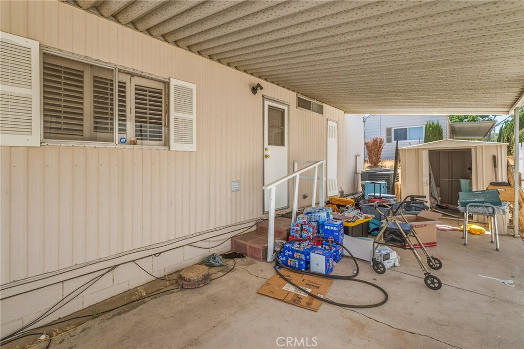 20683 Waalew Road, Unit B201 Apple Valley, CA 92307 - Photo 24 of 32 a view of a dinning table and chairs in the patio