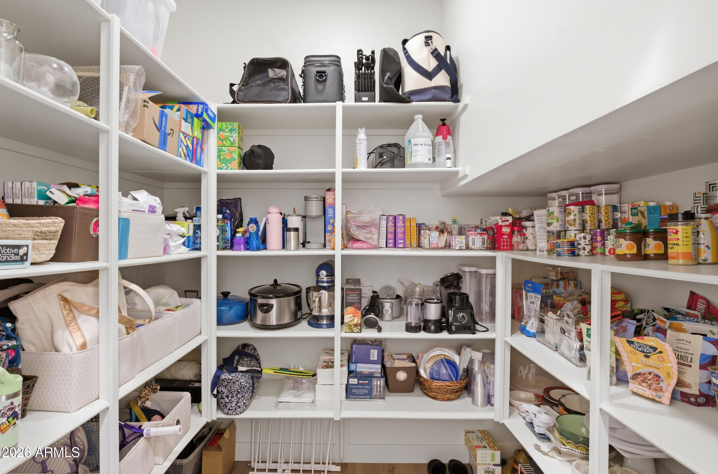 40 West Frier Drive Phoenix, AZ 85021 - Photo 14 of 54 a kitchen with lots of clutter and cabinets