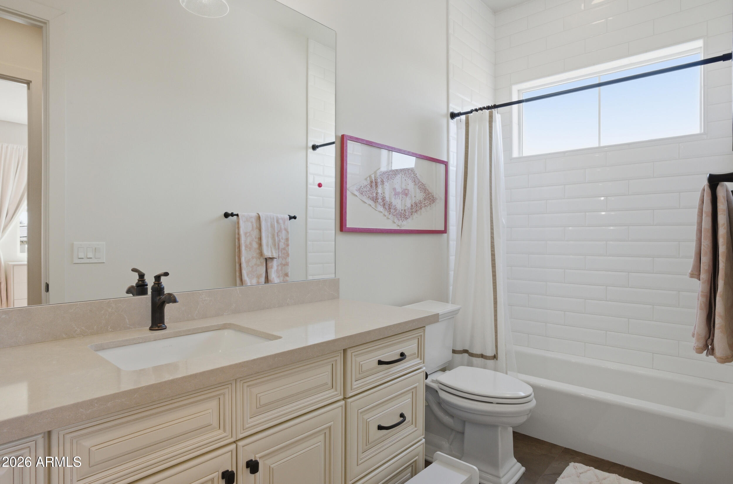 40 West Frier Drive Phoenix, AZ 85021 - Photo 34 of 54 a bathroom with a sink a toilet and shower